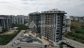 Квартира 1+1 в новом ЖК, 55 кв.м. Махмутлар, Алания - Ракурс 9