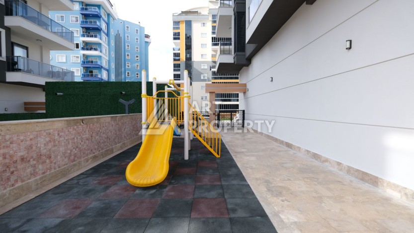 Квартира 1+1 в новом ЖК, 55 кв.м. Махмутлар, Алания - Ракурс 15