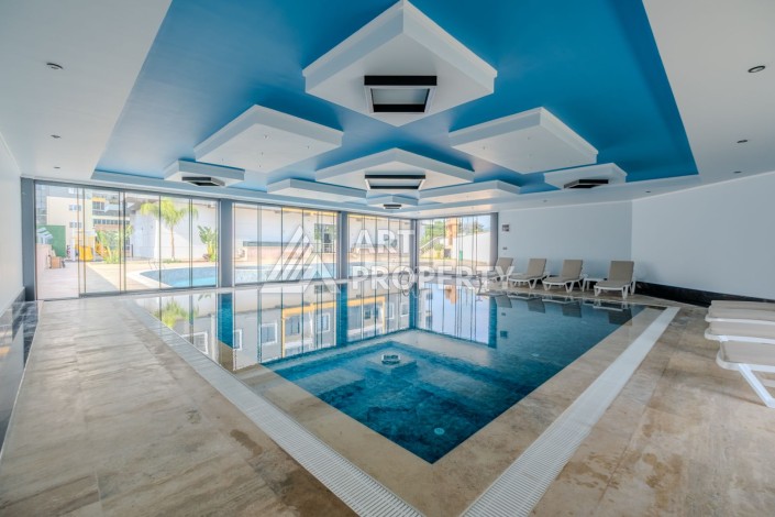 Квартира 1+1 в новом ЖК, 55 кв.м. Махмутлар, Алания - Ракурс 16