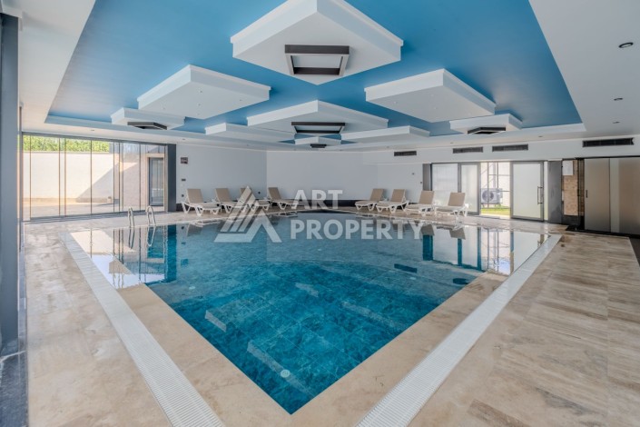 Квартира 1+1 в новом ЖК, 55 кв.м. Махмутлар, Алания - Ракурс 17