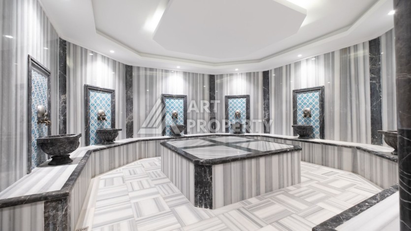 Квартира 1+1 в новом ЖК, 55 кв.м. Махмутлар, Алания - Ракурс 20