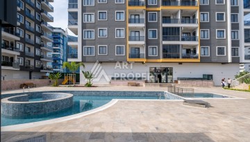 Квартира 1+1 в новом ЖК, 55 кв.м. Махмутлар, Алания - Ракурс 23