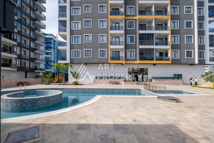 Квартира 1+1 в новом ЖК, 55 кв.м. Махмутлар, Алания - Ракурс 22
