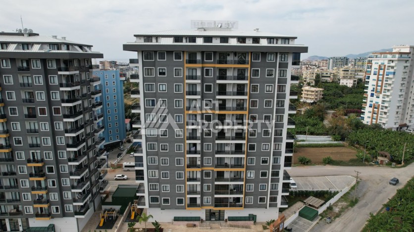 Квартира 1+1 в новом ЖК, 55 кв.м. Махмутлар, Алания - Ракурс 23