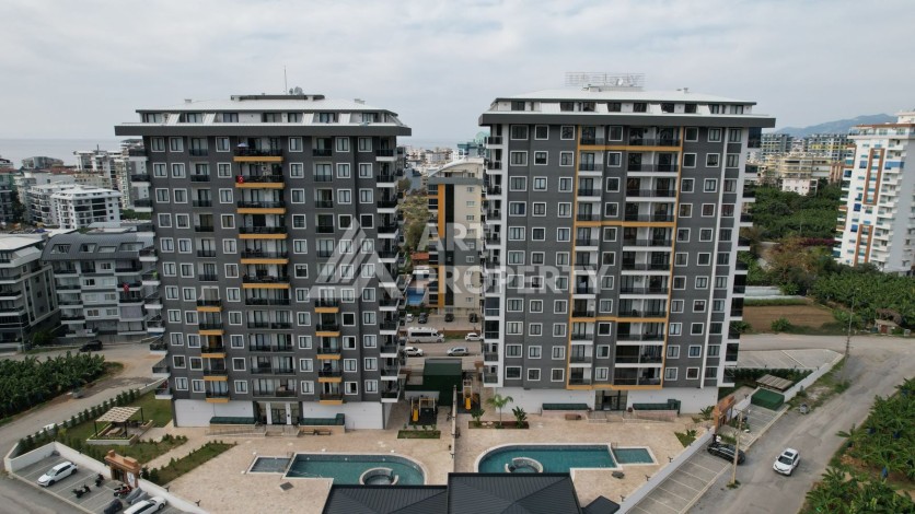Квартира 1+1 в новом ЖК, 55 кв.м. Махмутлар, Алания - Ракурс 24