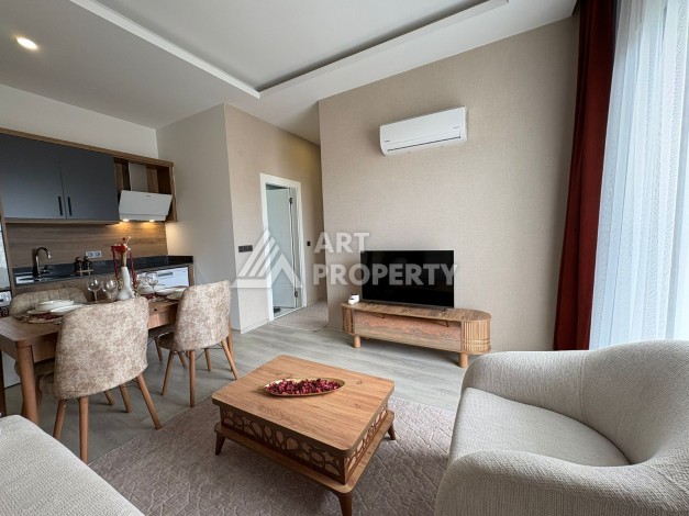 Квартира 1+1 в центре Махмутлара, 50 кв.м. - Ракурс 2