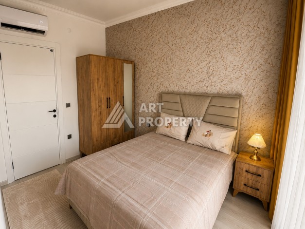 Квартира 1+1 в центре Махмутлара, 50 кв.м. - Ракурс 7