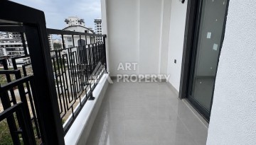 Квартира 1+1 в центре Махмутлара, 50 кв.м. - Ракурс 11