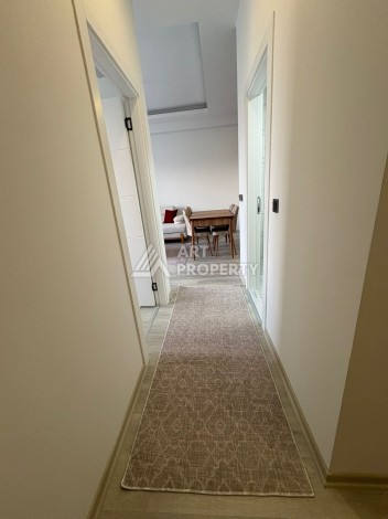 Квартира 1+1 в центре Махмутлара, 50 кв.м. - Ракурс 11