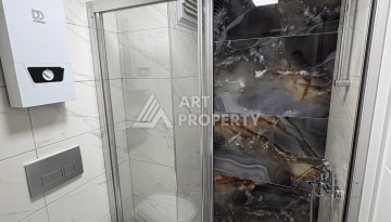 Квартира 1+1 в центре Махмутлара, 50 кв.м. - Ракурс 13