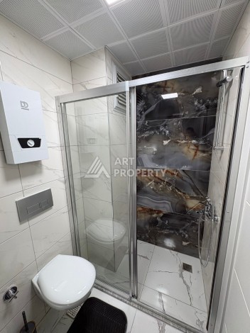 Квартира 1+1 в центре Махмутлара, 50 кв.м. - Ракурс 12