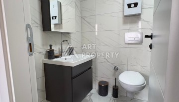 Квартира 1+1 в центре Махмутлара, 50 кв.м. - Ракурс 14