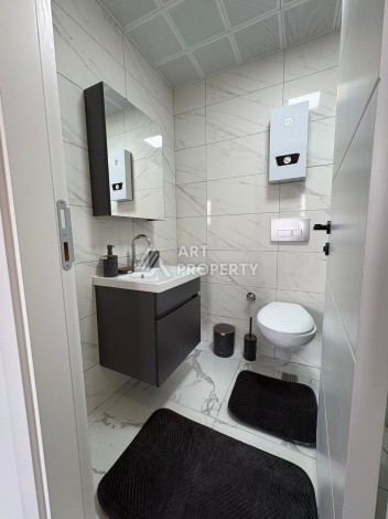 Квартира 1+1 в центре Махмутлара, 50 кв.м. - Ракурс 13