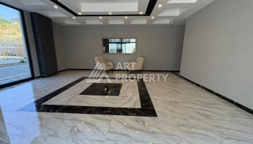 Квартира 1+1 в центре Махмутлара, 50 кв.м. - Ракурс 21