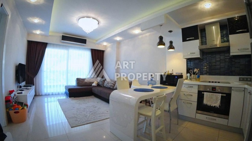 Квартира 1+1 в премиальной резиденции, 75 кв.м.в Махмутларе - Ракурс 1