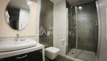 Квартира 1+1 в премиальной резиденции, 75 кв.м.в Махмутларе - Ракурс 9