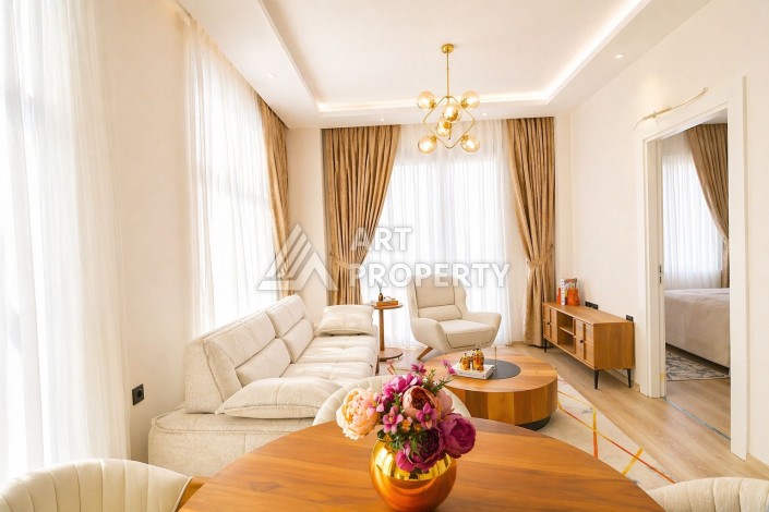Стильная квартира 1+1 в Махмутларе, 55 кв.м. - Ракурс 1