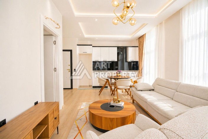 Стильная квартира 1+1 в Махмутларе, 55 кв.м. - Ракурс 2