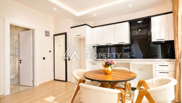 Стильная квартира 1+1 в Махмутларе, 55 кв.м. - Ракурс 4
