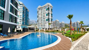 Стильная квартира 1+1 в Махмутларе, 55 кв.м. - Ракурс 9