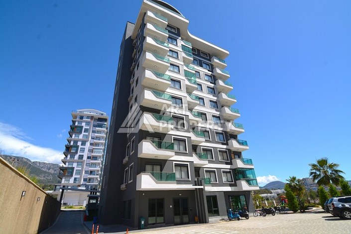 Стильная квартира 1+1 в Махмутларе, 55 кв.м. - Ракурс 9