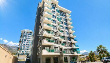 Стильная квартира 1+1 в Махмутларе, 55 кв.м. - Ракурс 19