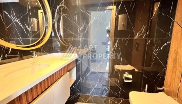 Дуплекс 2+1 с видом на море в центре Алании в легендарном проекте города - Ракурс 17