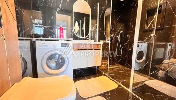 Дуплекс 2+1 с видом на море в центре Алании в легендарном проекте города - Ракурс 21