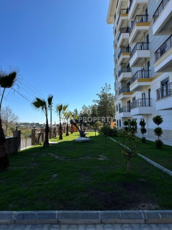 Квартира 2+1 с собственным садом 30 кв.м. в Авсалларе - Ракурс 21