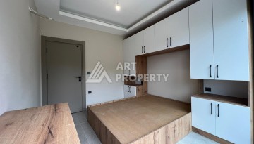 Квартира 2+1 с собственным садом 30 кв.м. в Авсалларе - Ракурс 35
