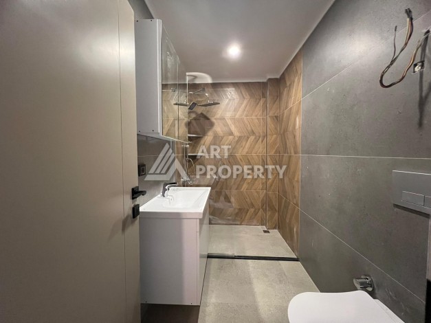 Квартира 2+1 с собственным садом 30 кв.м. в Авсалларе - Ракурс 35