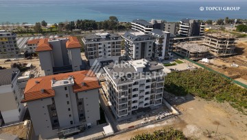 Светлая квартира 1+1 с видом на море, 50 кв.м. Каргыджак, Алания - Ракурс 11