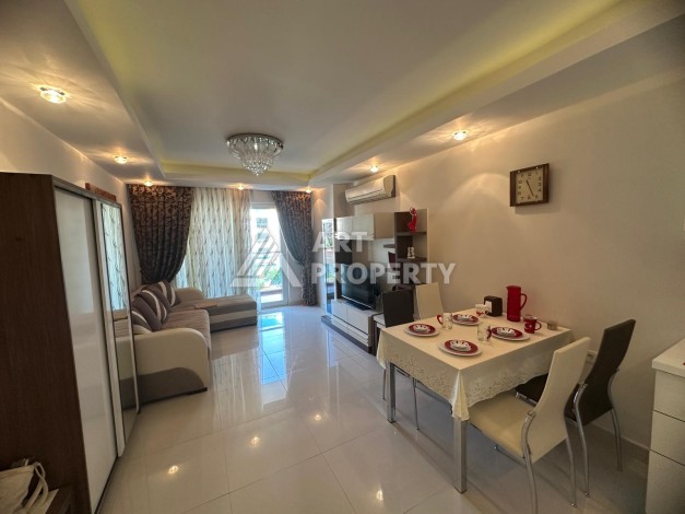 Просторная квартира 1+1 в Махмутларе, до моря 150 м. - Ракурс 1