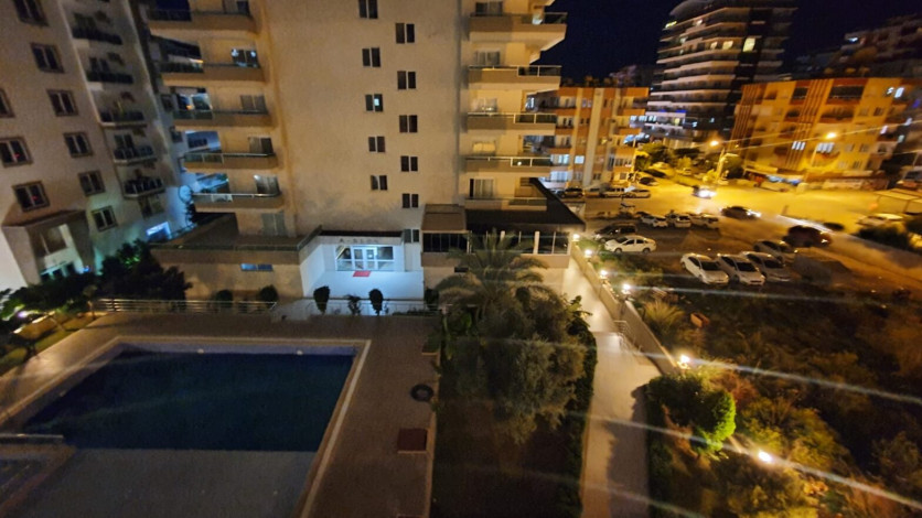 Меблированная двухкомнатная квартира в комплексе с полной инфраструктурой в районе Махмутлар , 65 м2 - Ракурс 12