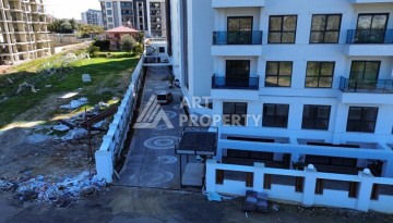 Квартира 2+1 в новой резиденции Махмутлара, 90 кв.м. - Ракурс 29