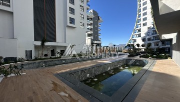 Квартира 2+1 в новой резиденции Махмутлара, 90 кв.м. - Ракурс 33