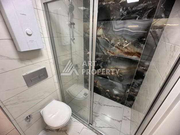 Квартира 1+1 в новой резиденции Махмутлара, 55 кв.м. - Ракурс 6