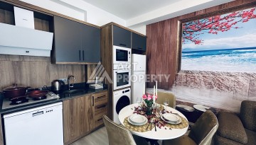 Квартира 1+1 в новой резиденции Махмутлара, 55 кв.м. - Ракурс 12