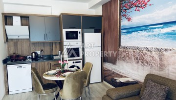 Квартира 1+1 в новой резиденции Махмутлара, 55 кв.м. - Ракурс 14