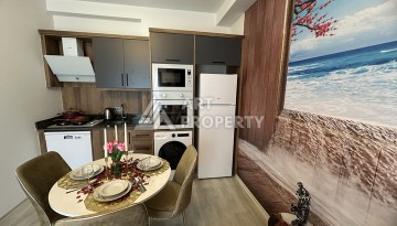 Квартира 1+1 в новой резиденции Махмутлара, 55 кв.м. - Ракурс 24