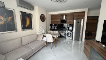 Квартира 1+1 в престижном ЖК Махмутлара, 55 кв.м. - Ракурс 2