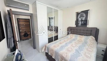 Квартира 1+1 в престижном ЖК Махмутлара, 55 кв.м. - Ракурс 3