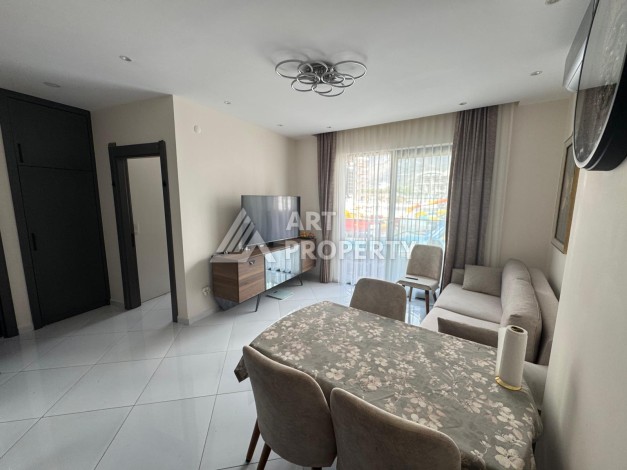 Квартира 1+1 в престижном ЖК Махмутлара, 55 кв.м. - Ракурс 4