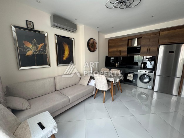 Квартира 1+1 в престижном ЖК Махмутлара, 55 кв.м. - Ракурс 5