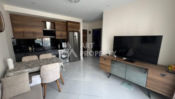 Квартира 1+1 в престижном ЖК Махмутлара, 55 кв.м. - Ракурс 7