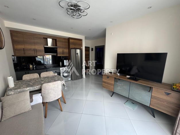 Квартира 1+1 в престижном ЖК Махмутлара, 55 кв.м. - Ракурс 6