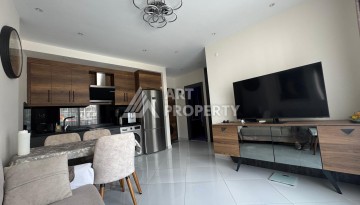 Квартира 1+1 в престижном ЖК Махмутлара, 55 кв.м. - Ракурс 9