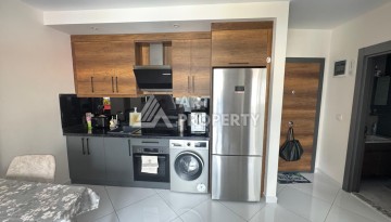 Квартира 1+1 в престижном ЖК Махмутлара, 55 кв.м. - Ракурс 11