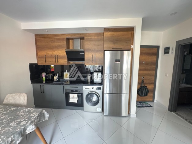 Квартира 1+1 в престижном ЖК Махмутлара, 55 кв.м. - Ракурс 10
