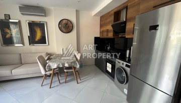 Квартира 1+1 в престижном ЖК Махмутлара, 55 кв.м. - Ракурс 12